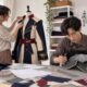 Anime costume DIY makers sewing a jacket and shaping EVA foam armor